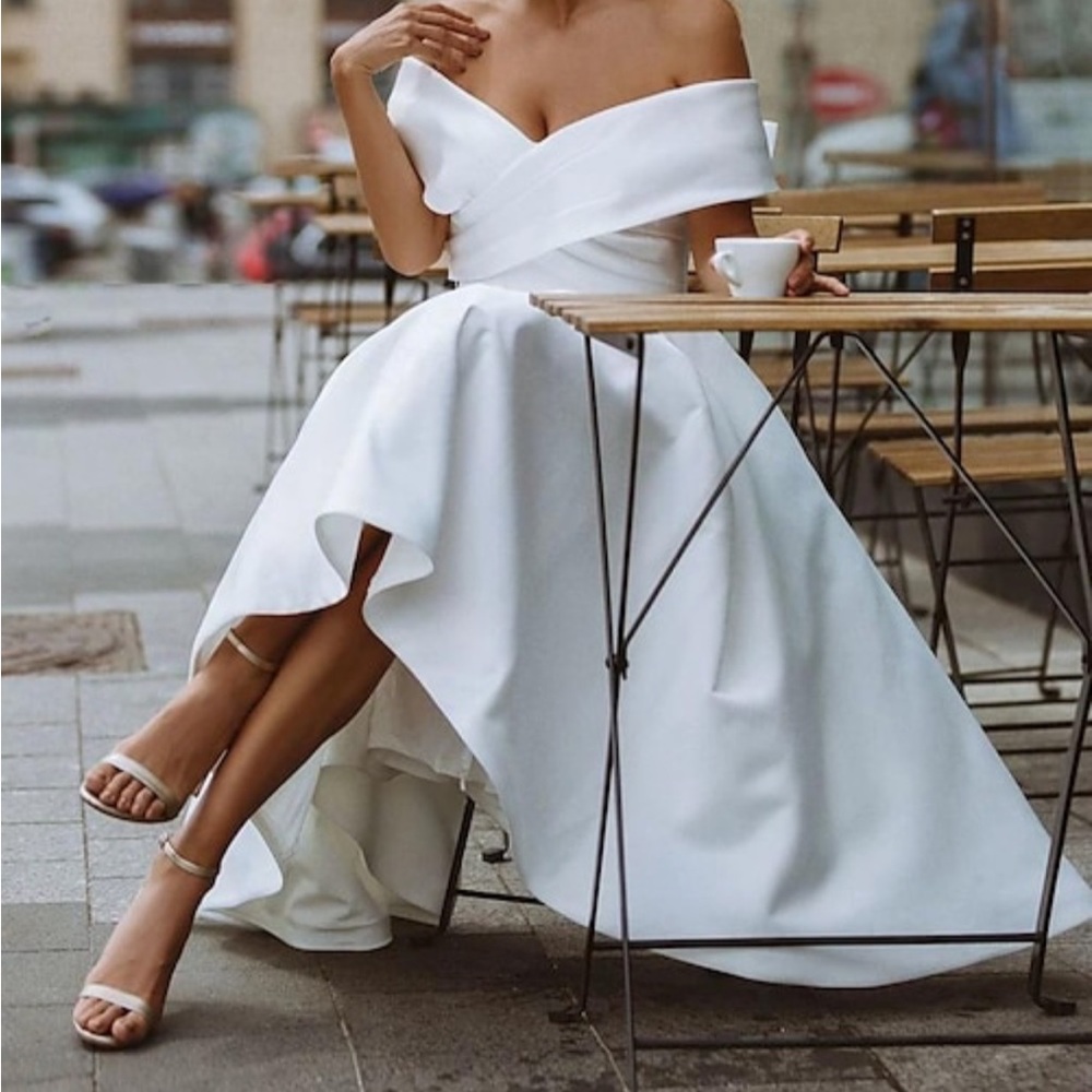 Cocktail length light blue satin, off shoulder, full skirt formal dress.